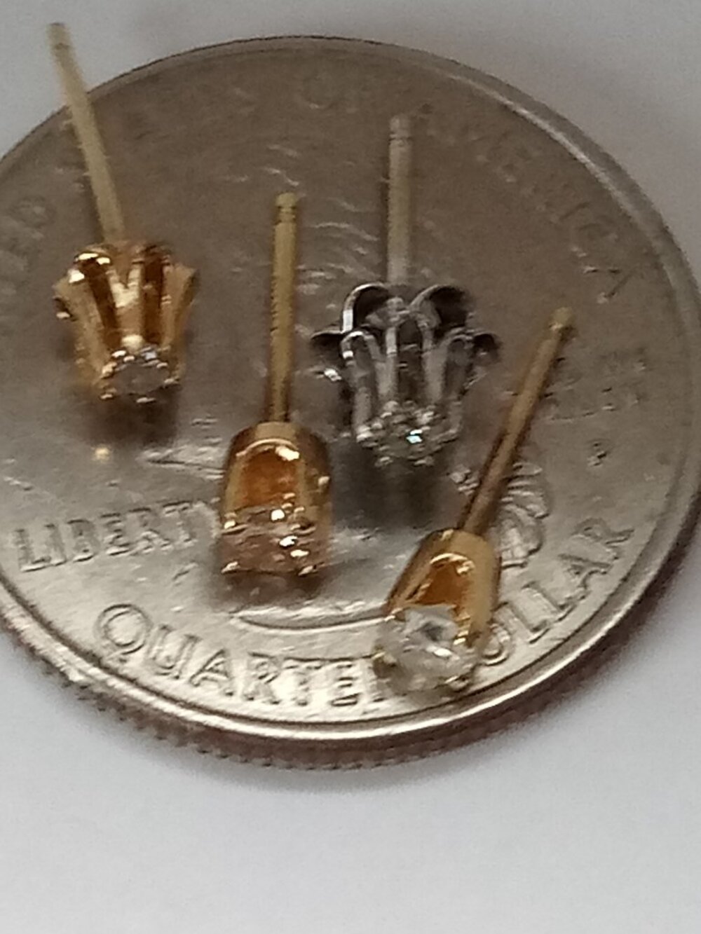 Genuine Diamond lot of 4  gold studs 1 pair 2 singles
